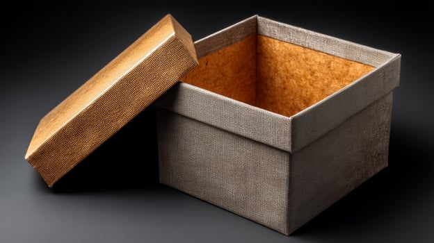 A carefully opened gift box showcases its empty interior. The box features a textured design and sits on a dark surface. This moment captures the anticipation of a special delivery or surprise. photo