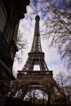 View of Eiffel Tower and Parisian Street on a Clear Winter Morning photo