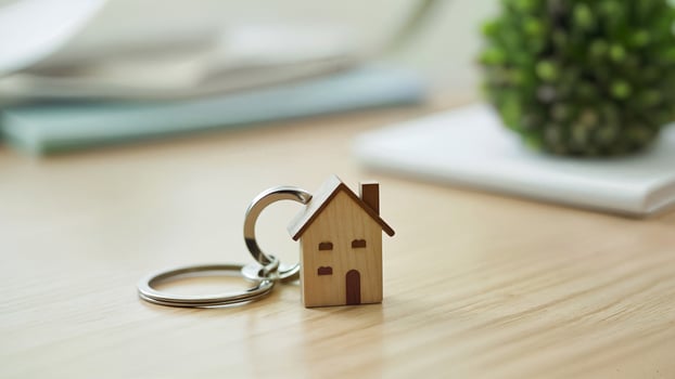 House Keychain Symbolizing Home Ownership Concept photo