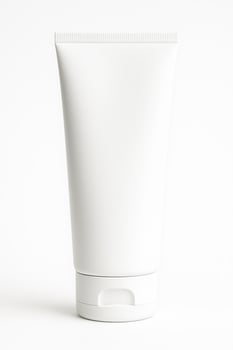 White Cylindrical Plastic Tube With Flip Top Cap for Lotion on Isolated White Background in High Definition photo