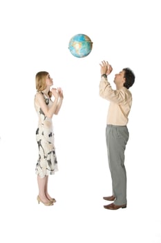 Couple playing with a globe photo