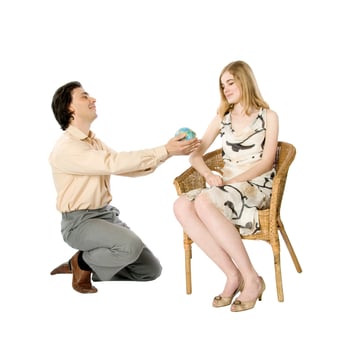 World as a gift, a man offers a globe to a woman photo