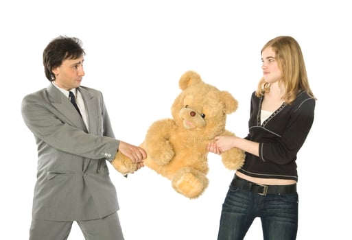 Fighting over a teddy-bear photo