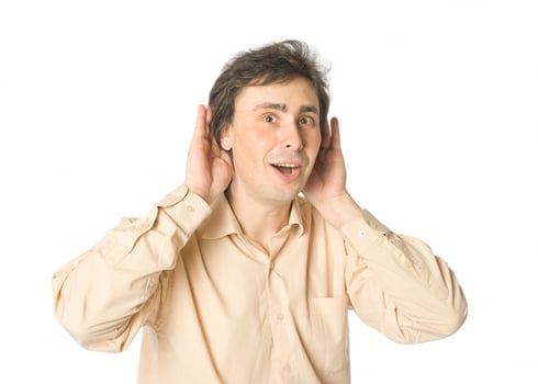 Good news, cheerful man over white photo