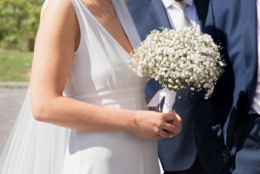 Bridal bouquet and a groom boutonniere of Gypsophila photo