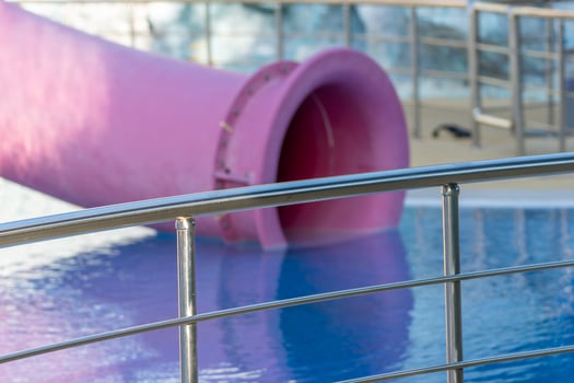 Water Slide, Pink, Waterpark. Closeup of a pink waterslide at a water park. photo