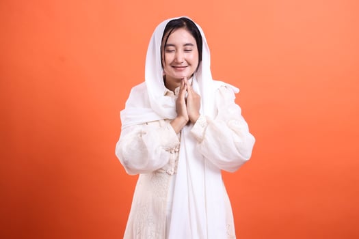 Serene reflection, A portrait of an asian woman in contemplation photo