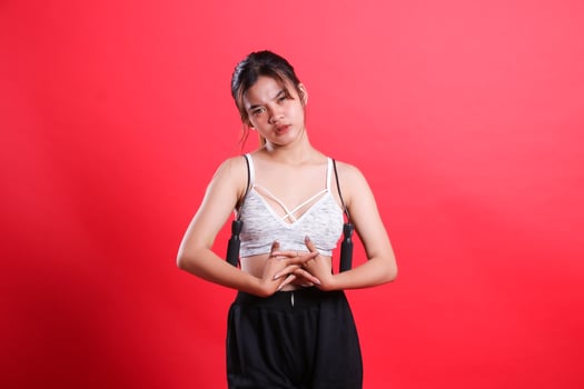 Woman with Jump Rope ISOLATED RED BACKGROUND photo