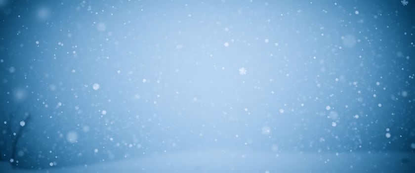 blue background with snow flakes on it photo