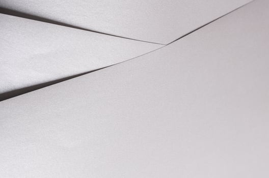 White and gray paper texture with metallic silver and platinum tones, sleek, glossy finish with photo