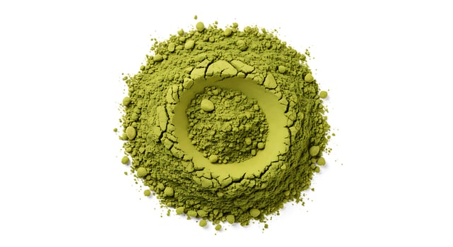A green powder is shown in the shape of an o photo
