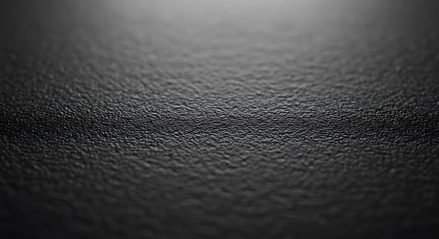 Black background with a shiny surface photo
