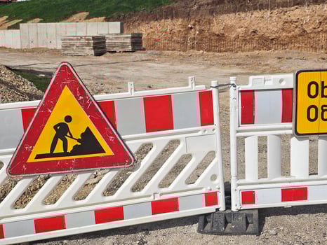 Safety signs warning about road works.The road is under construction or repair. photo