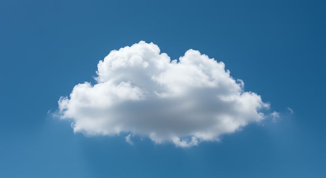 A large white cloud is shown in the sky photo