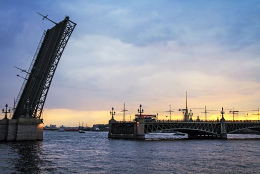 Opening of Trinity Bridge at sunset in Saint Petersburg, Russia. photo