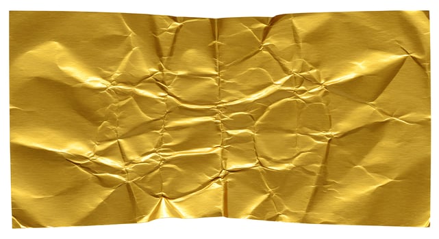 Crumpled gold foil background photo