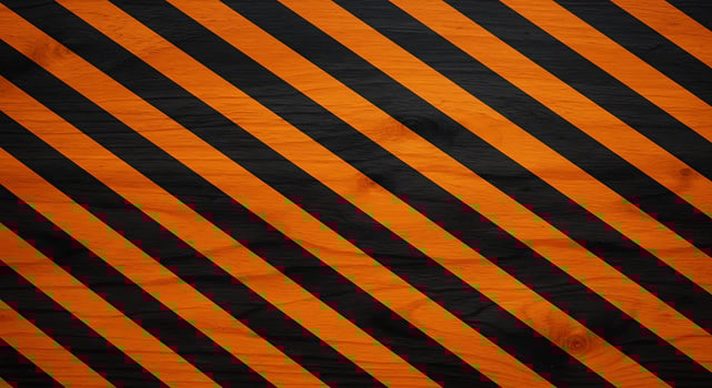 A black and orange striped background with a warning sign photo