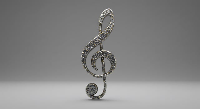 A diamond treble clef pendant photo