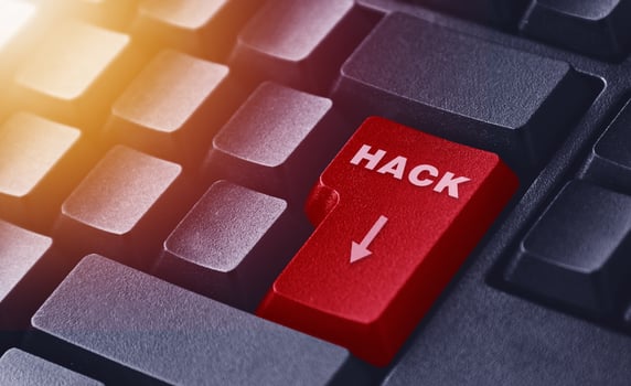The hack button illustration on a black keyboard. Cybercrime button illustration photo