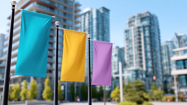 Colorful banners fluttering in light wind in front of modern urban buildings on clear day, creating vibrant city atmosphere photo