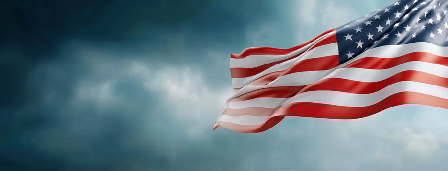 An american flag is flying in the wind photo