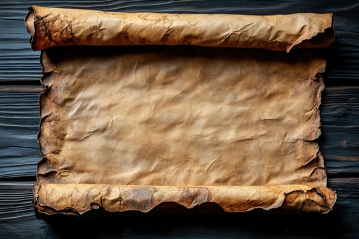 Aged scroll on dark wooden planks. photo
