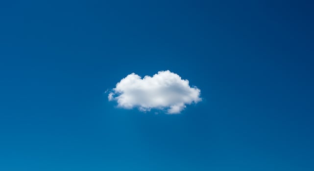 White Cloud Floating in Blue Sky photo