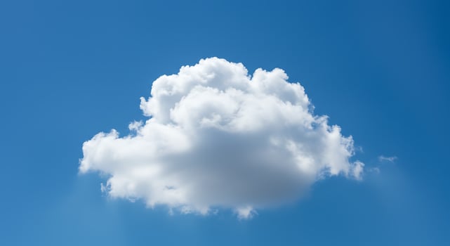 Single Cumulus Cloud in a Clear Blue Sky photo