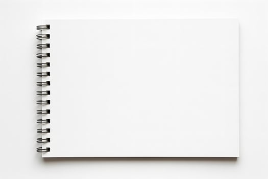 An open notebook with a blank page on a white background photo