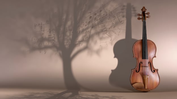 Wooden Violin with Musical Note Tree Shadow on Grey Background photo