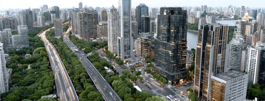 A city with tall buildings and a highway photo