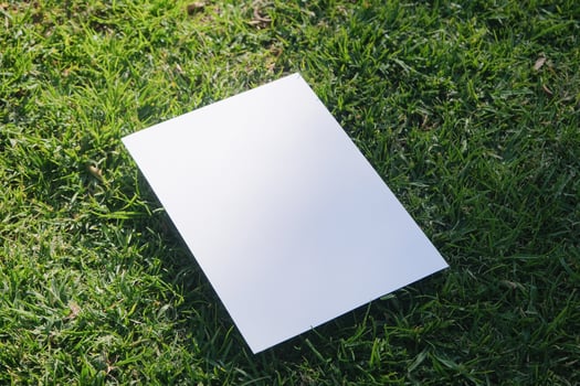 Mockup poster on green grass background photo