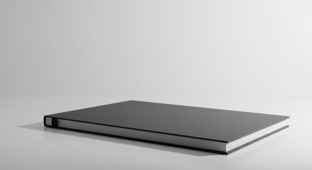 Minimalist dark grey book mockup on reflective surface studio shot photo