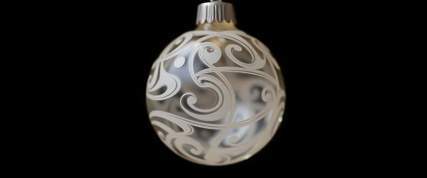 glass ornament hanging on a black background photo