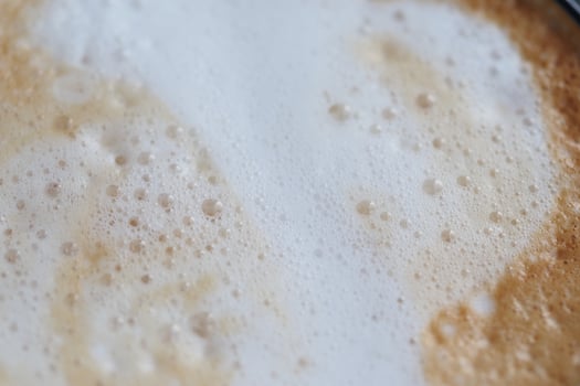 Delicious latte art creates creamy texture in warm coffee beverage photo