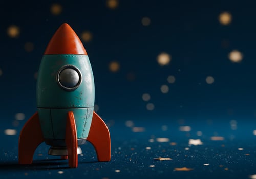 Toy rocket on dark blue background with star like lights photo