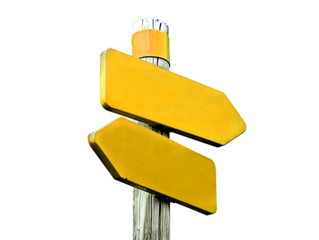 Yellow wooden signpost showing the way photo