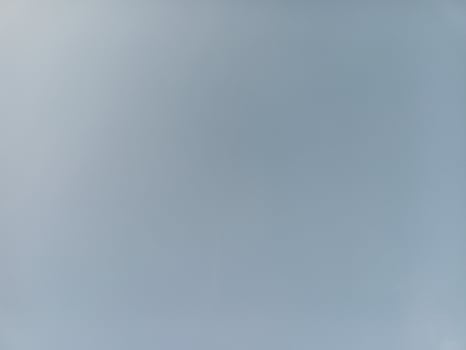 Wispy clouds in daylight photo