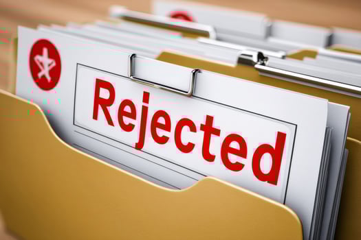 Rejected documents in hanging file folders showing unsuccessful applications photo