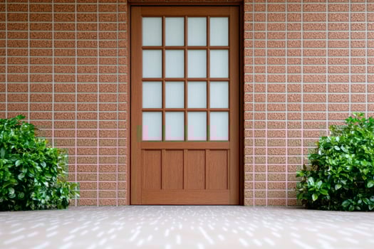 Simple Wooden Door with Brick Wall and Lush Plants photo