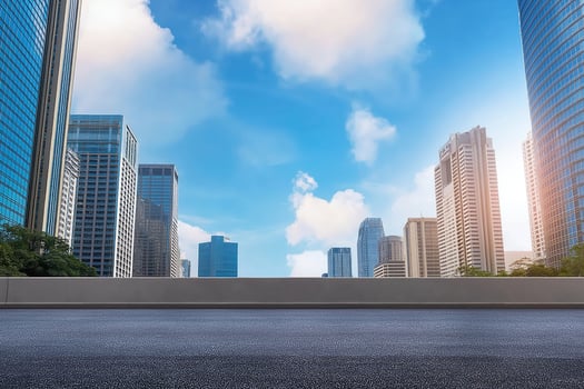 Modern Cityscape Asphalt Road and High Rise Buildings under a Sunny Sky photo
