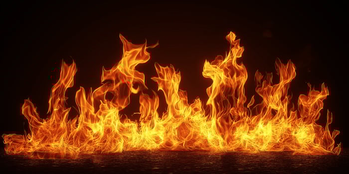 Fire flames on a black background. Blaze fire flame texture background. Close up of fire flames isolated on black background. Burn. Abstract fire flames background. Texture. photo