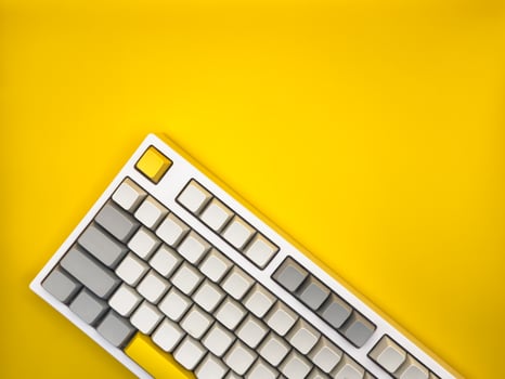 A top view of keyboard without letters on an empty yellow space on a background, for technology concept. Copy space. photo