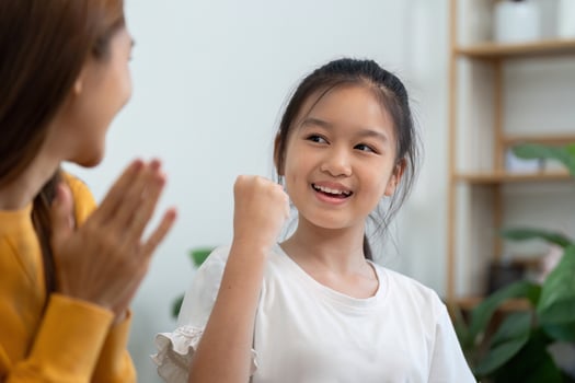 Back to school learning activity between mother and daughter photo