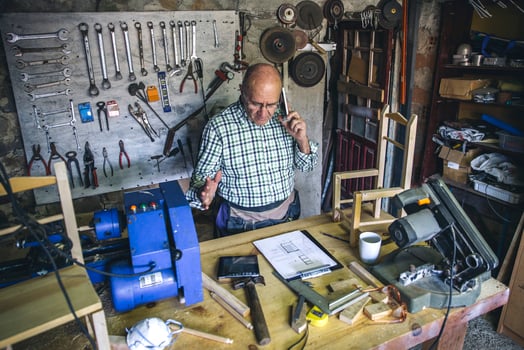 Carpenter working in his workshop photo