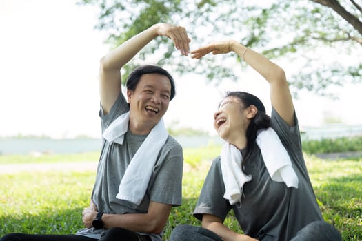 Wellness and yoga joy captured in playful seniors couple moment photo