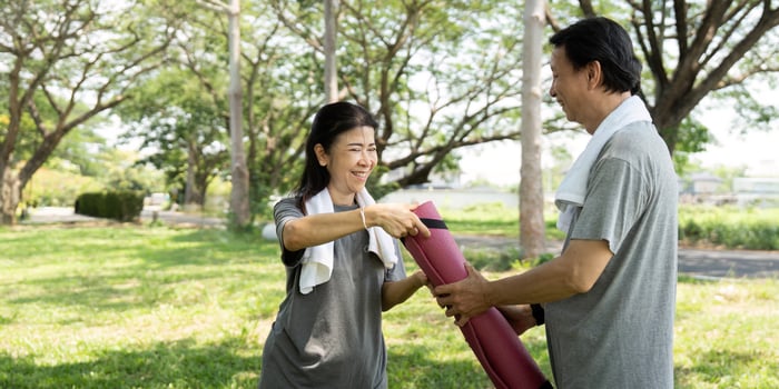 Wellness and yoga practices enhancing connection for seniors couple photo