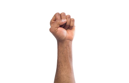 Male black fist isolated on white background. African american clenched hand, gesturing up. Counting, aggression, brave, masculinity concept photo