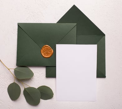 Wedding mockup concept. Craft envelopes with empty postcard for invitation text on white background photo