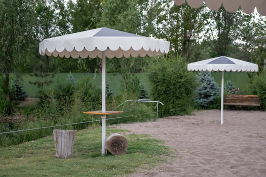 beach umbrella white with gray close up photo